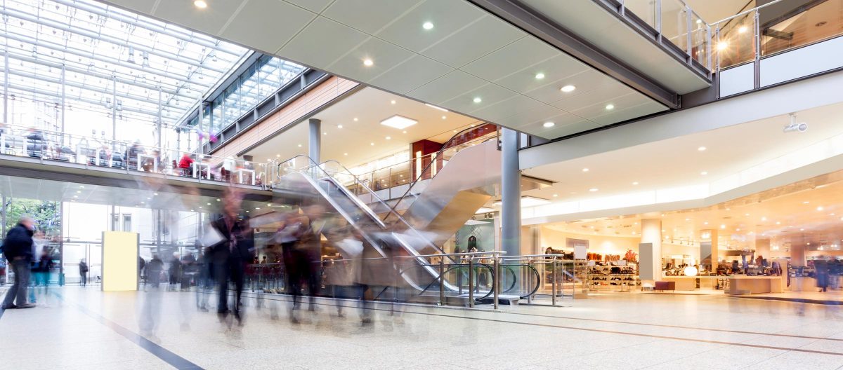 People counting in shopping centres Blurred people in a shopping centre